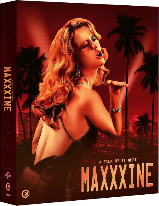 A woman with blonde hair blows a kiss against a red-toned Los Angeles skyline.