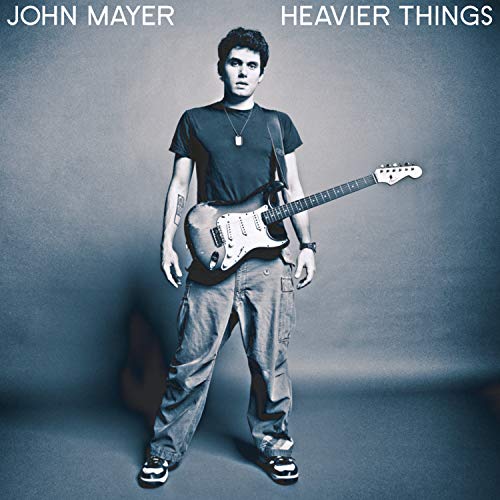 John Mayer album cover, "Heavier Things," featuring Mayer with a guitar.