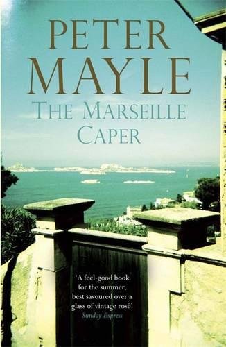 Book cover: “The Marseille Caper” by Peter Mayle, with coastal view.