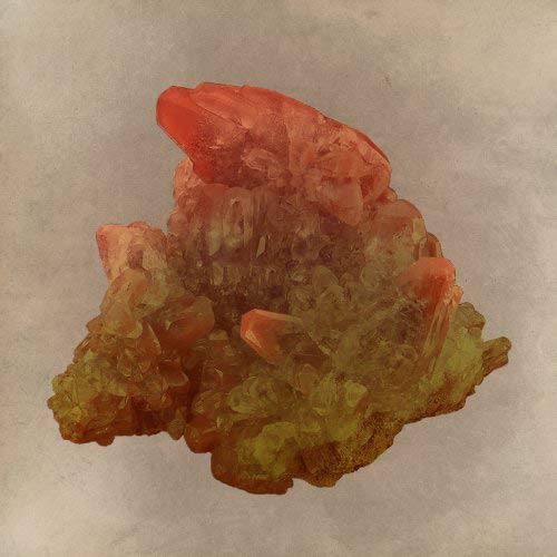 Red and yellow mineral cluster on a textured, beige background.