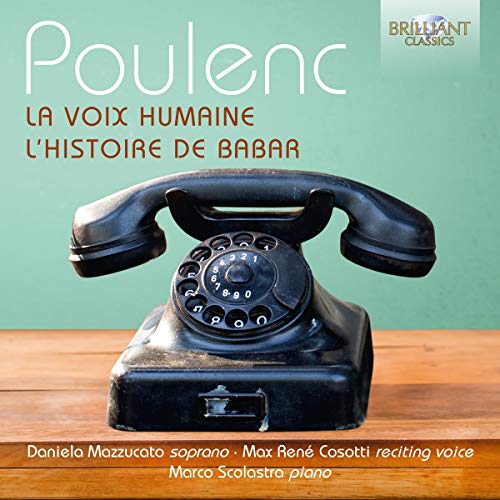 CD cover featuring an old black rotary phone on a wooden surface.