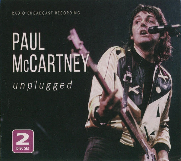 Paul McCartney performing with a guitar on the "Unplugged" CD cover.