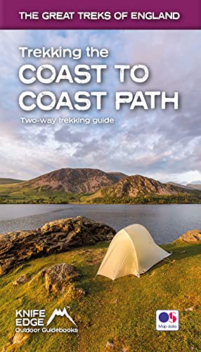 Guidebook cover featuring a tent by a lake and distant mountains.