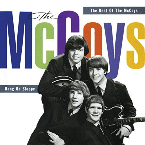 The McCoys band members in suits posing for their Hang On Sloopy album cover.