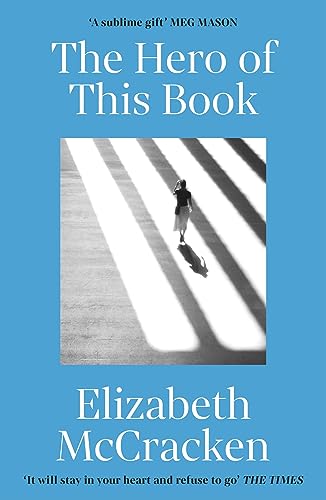 Book cover: woman walking on a crosswalk in strong sunlight.