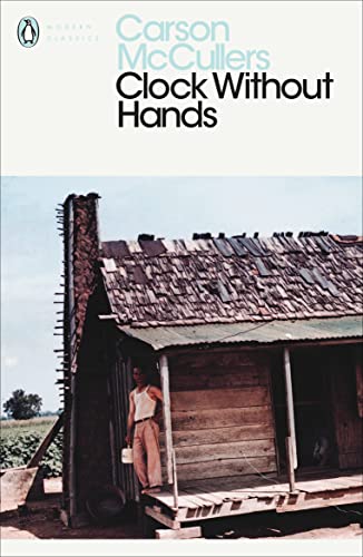 Book cover showing a man standing on the porch of a weathered wooden shack.