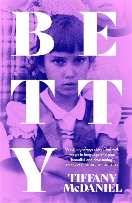 Book cover: "Betty" by Tiffany McDaniel, featuring a young girl’s portrait.
