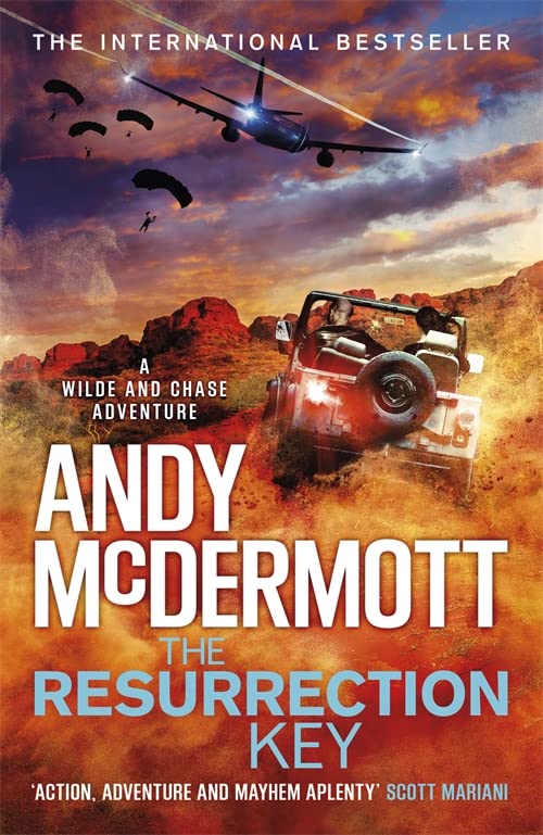 Book cover: desert landscape, jeep, parachutists, and large text title “Resurrection Key”.