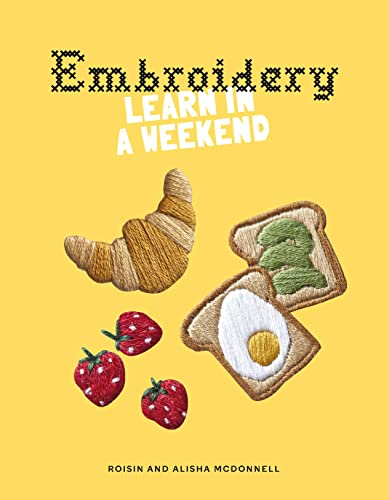 Book cover with yellow background featuring embroidered croissant, toast, and strawberry designs.