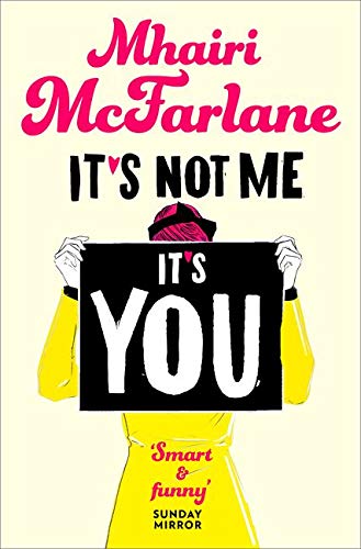 Book cover: woman holding a sign reading "It’s You" in bold letters.