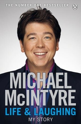 Book cover featuring Michael McIntyre smiling, wearing a suit, with title "Life & Laughing".