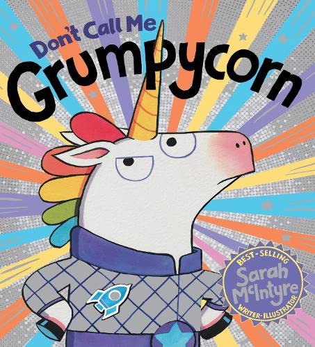 A grumpy unicorn wearing a space suit against a colorful, radiating starburst background.