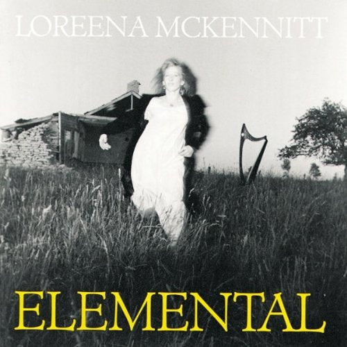 Loreena McKennitt album cover, woman running in a field with a harp.