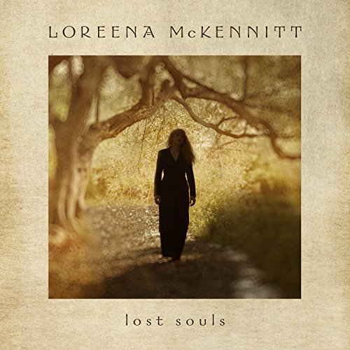 CD cover: woman in dark dress walking down a tree-lined path.
