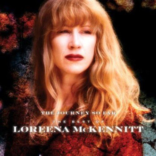 "Loreena McKennitt's album cover featuring a woman with long blonde hair against a dark background."