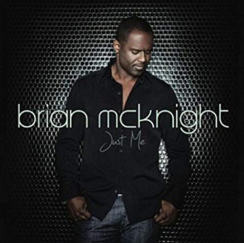 Brian McKnight album cover, "Just Me", featuring a portrait of the artist.