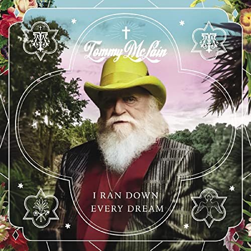 Album cover featuring Tommy McLain in a yellow hat and floral border.