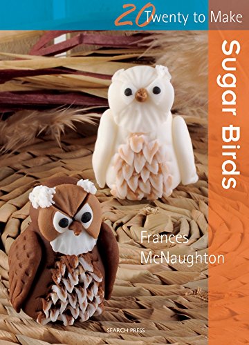 Book cover featuring two handmade, white and brown sugarcraft owl figurines.