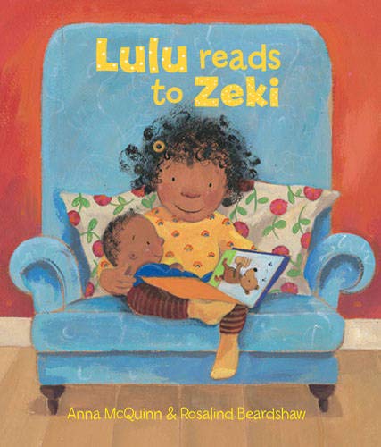 Girl reading to a doll in a blue armchair, illustrated cover.