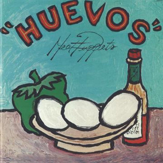 Album cover with "HUEVOS" text, three eggs on a plate, pepper, and bottle.