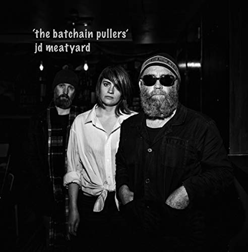 Black and white photo of three people, album cover for JD Meatyard.