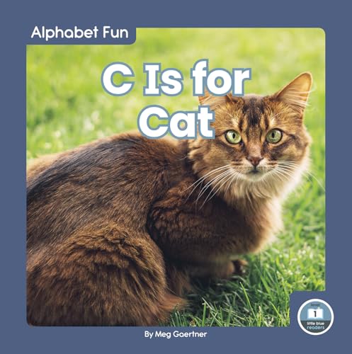 Book cover featuring a brown tabby cat sitting in green grass.