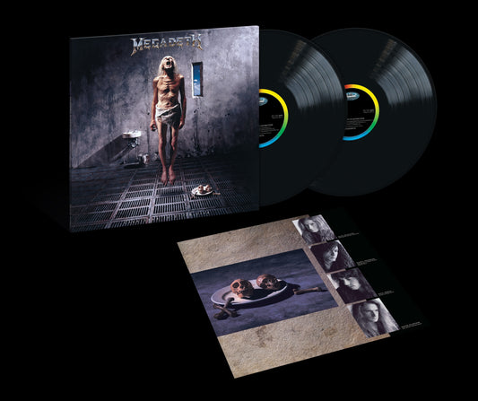 Megadeth's "Countdown to Extinction" vinyl record with album artwork and inserts.