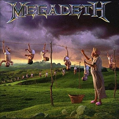 An album cover with a woman hanging babies on a clothesline outdoors.