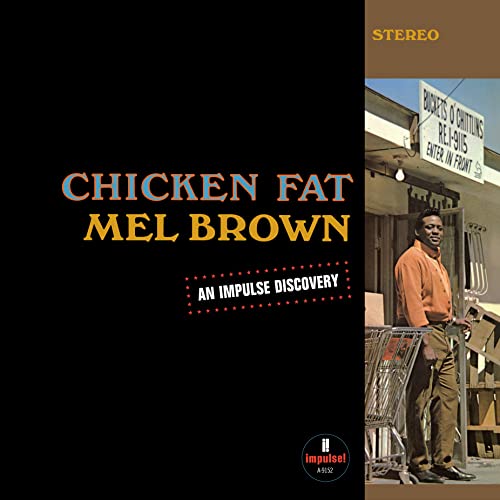 Album cover for Mel Brown's Chicken Fat featuring the artist standing by a shopping cart.