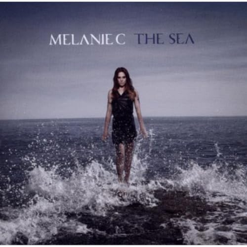Melanie C album cover, woman waist-deep in ocean waves.