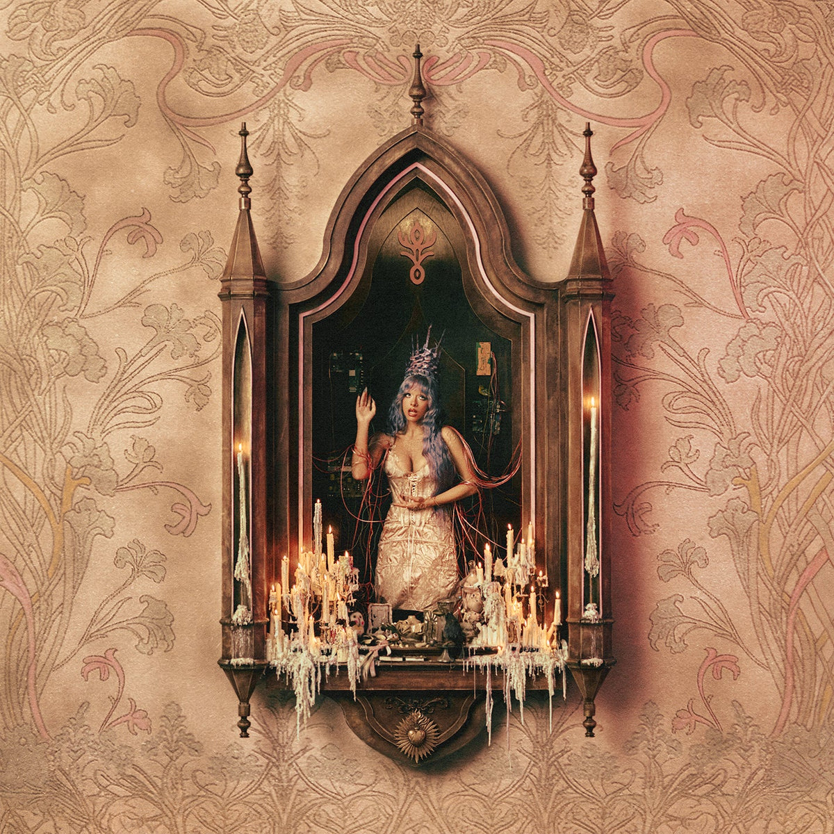 Melanie Martinez album cover: ornate frame, woman with blue hair, candles.