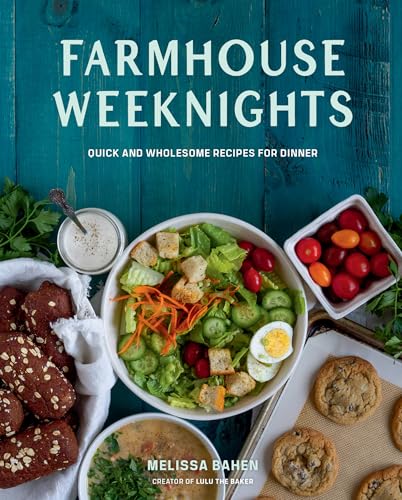 Cookbook cover with salad, bread, and soup on a blue wooden surface.