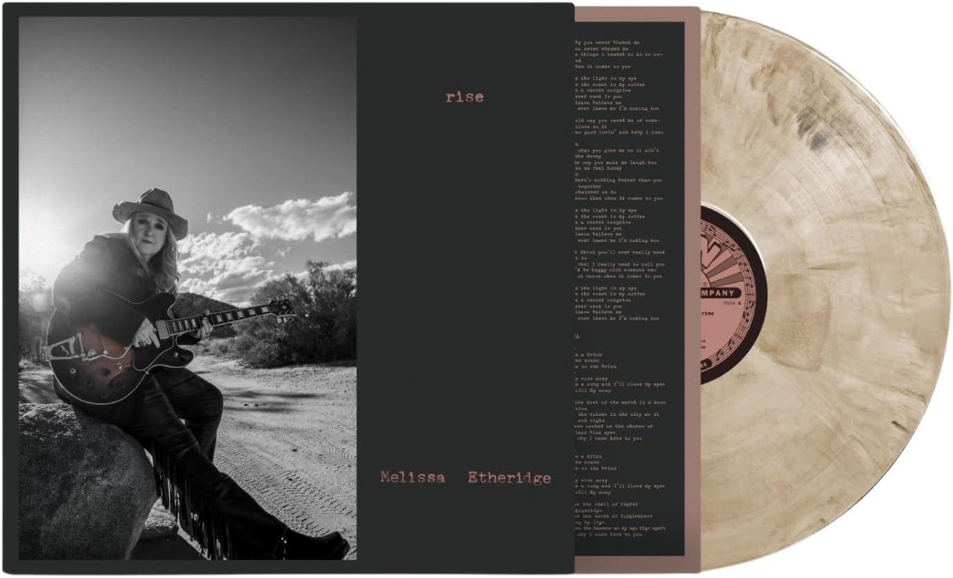 Melissa Etheridge “Rise” vinyl record with album cover and artist portrait.