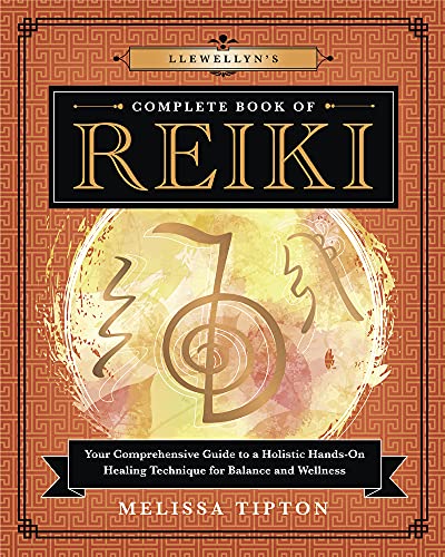 Book cover with Reiki symbols and orange geometric patterned background.