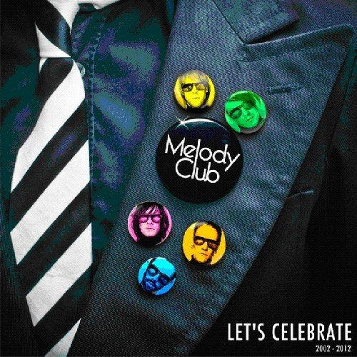 "CD cover with blue jacket and five badges featuring band members' faces."
