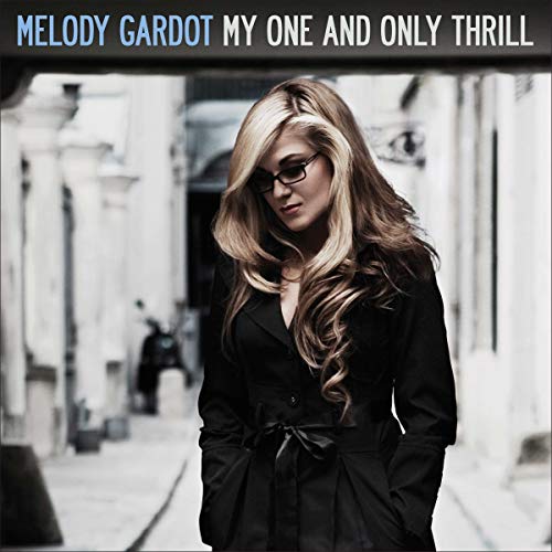 CD cover featuring Melody Gardot in sunglasses, standing in a city.