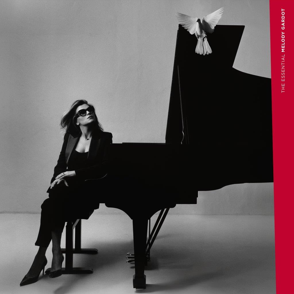 Melody Gardot album cover featuring a woman and a white dove near a piano.