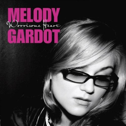 Black and white portrait of Melody Gardot wearing glasses, album cover.