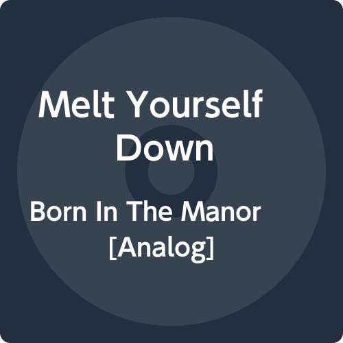 The image is a digital representation of a vinyl record. The image is a dark blue square with a circular shape in the center, resembling a vinyl record. The text "Melt Yourself Down" is prominently displayed, followed by "Born In The Manor [Analog]" below it. The background of the image is a dark blue color, which represents the sleeve or packaging of the vinyl record. The overall design suggests that this is an album cover for a music release on vinyl format. A