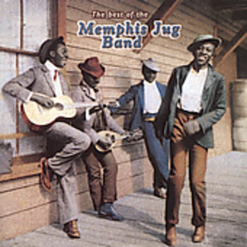 "Album cover featuring four men in suits, hats, and playing instruments outside a building."