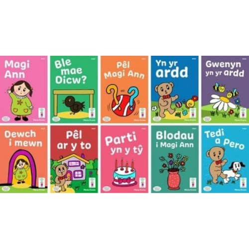 Colorful boxed set of Welsh children’s reading cards with illustrated scenes.