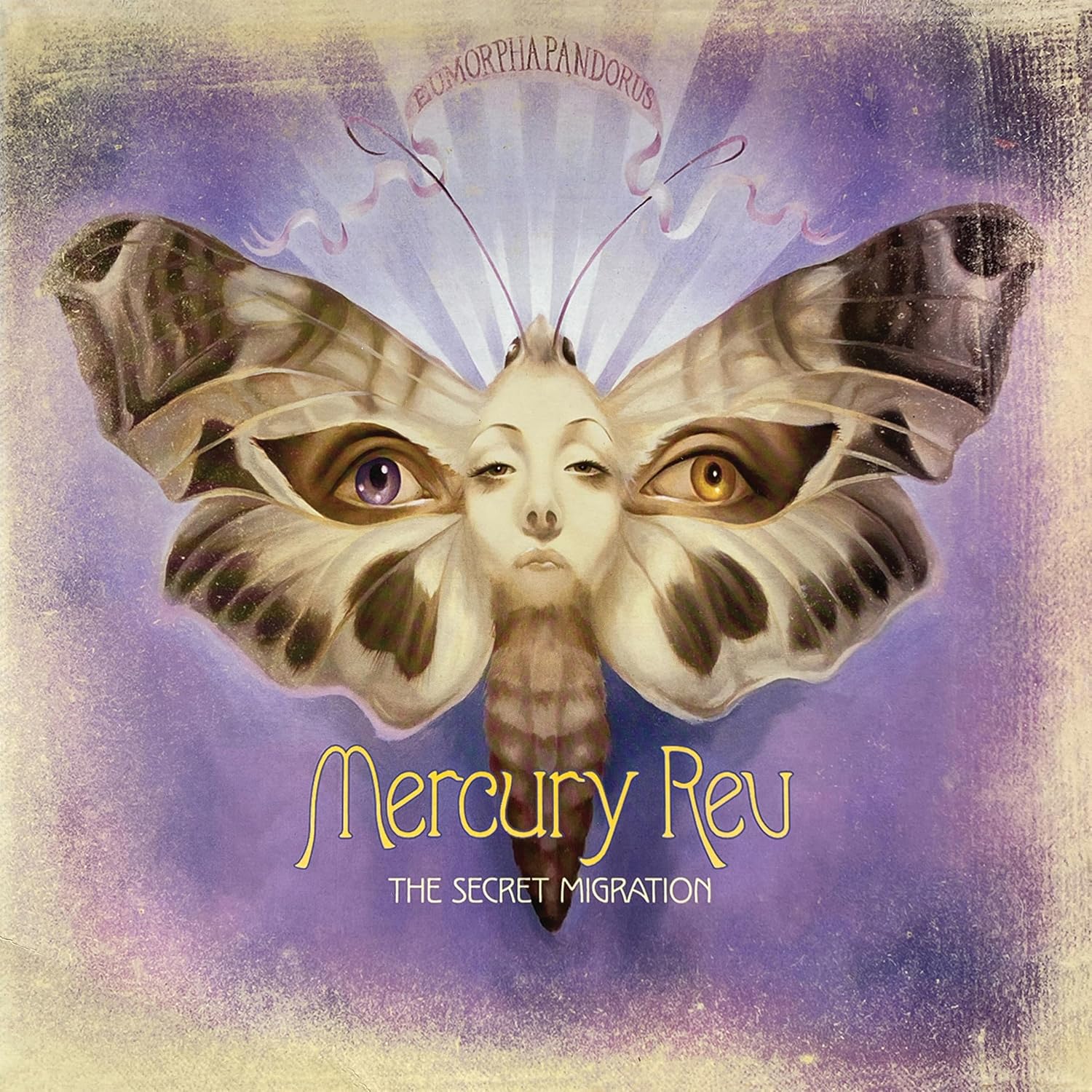 Album cover: butterfly wings forming a face, purple and beige tones.
