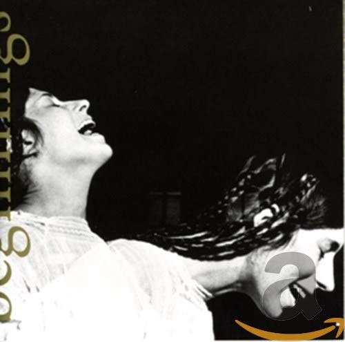 Black and white CD cover featuring a woman with eyes closed, singing.