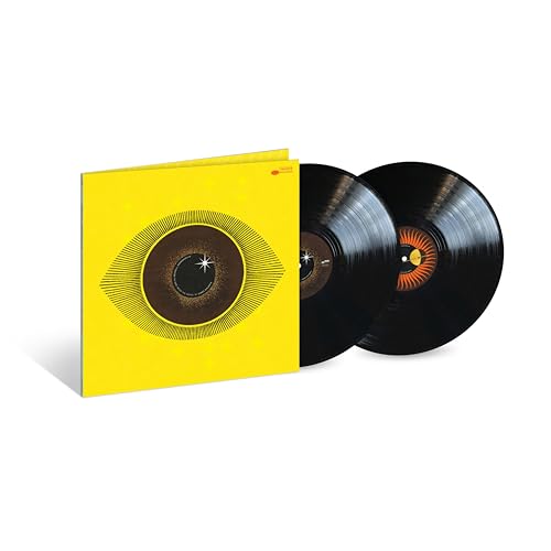 Yellow vinyl record sleeve with an eye design and two black records.