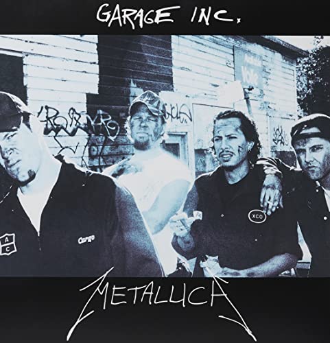 Black and white photo of Metallica band members in front of graffiti.