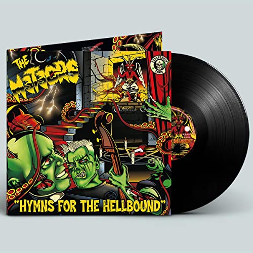 Horror-themed vinyl record with monsters, demons, and fiery imagery on the cover.