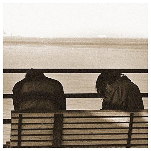 Cassette album cover: two figures seen from behind, facing water.