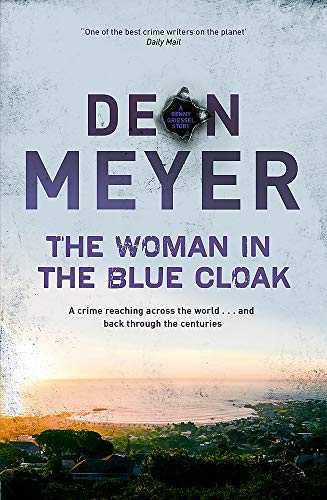 Book cover for The Woman in the Blue Cloak by Deon Meyer featuring coastal scenery.