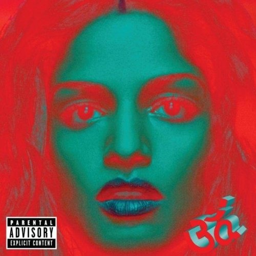 M.I.A.’s album cover: a distorted, colorful portrait with red and teal tones.