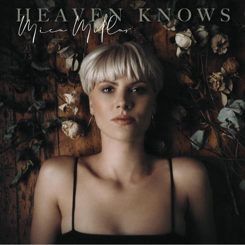 CD cover: Mica Millar portrait with dried flowers, dark background.